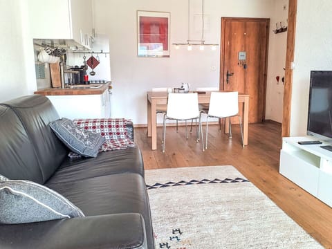 Furniture, Flooring, Interior Design, Floor, Wood, Couch, Room, Living Room, Wood Flooring, Table