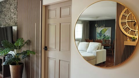 Welcome to Diamond — a modern tropical retreat where comfort meets elegance.
Soft neutrals, warm wood tones, and lush greenery set the tone for a relaxing stay