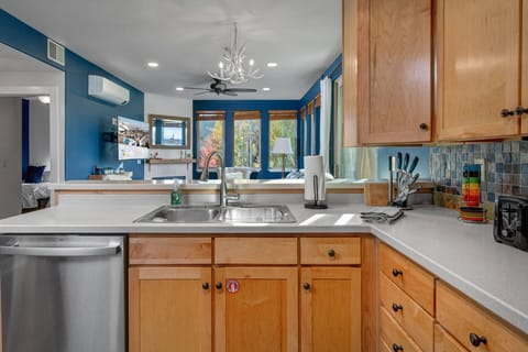 Crestview Commons A207: Fully equipped kitchen with dishwasher and sink.