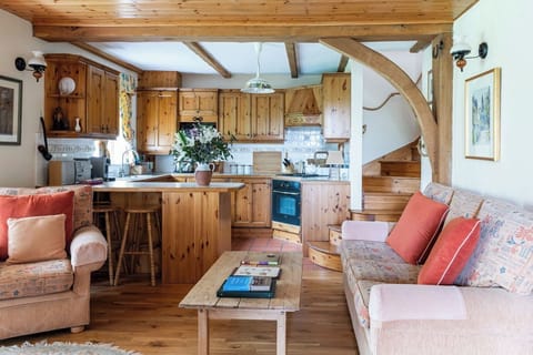 Open plan living room and galley kitchen.