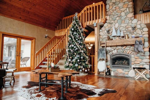 interior, interior staircase, handrail, indoor, shared space, dining table, fireplace