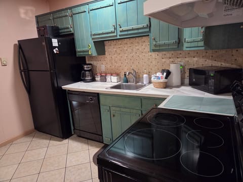 Stocked kitchen-with Coffee Maker/Coffee Bar, coffee, tea, hot cocoa, sugar.