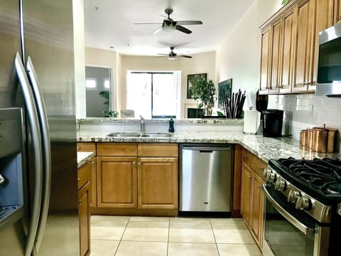 Kitchen with all Stainless Appliances and Gas stove