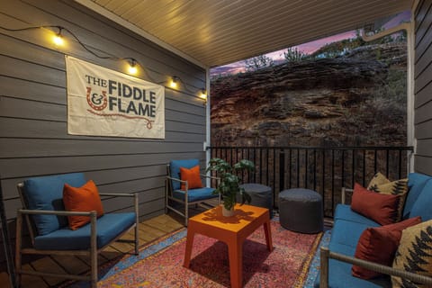 Private outdoor patio with awesome, unique rock feature wall. 
