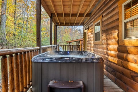 Unwind in the hot tub while taking in the fresh air from the deck.