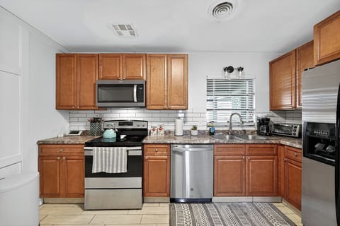 Fully stocked kitchen with coffee maker and all appliances for your convenience