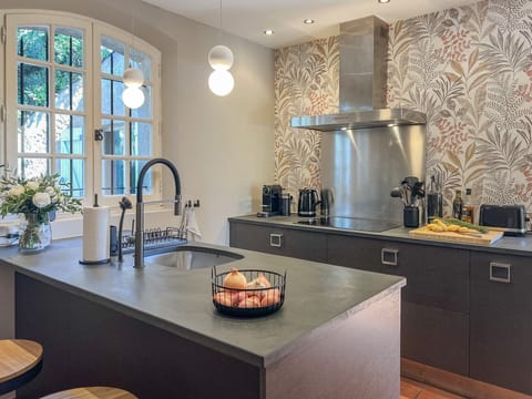 Kitchen with a view to the private front courtyard