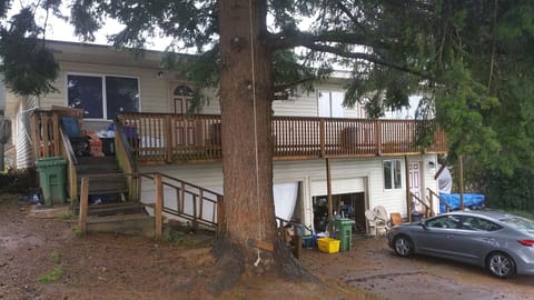 Property is on a sloping street. Front and rear deck entries are street level