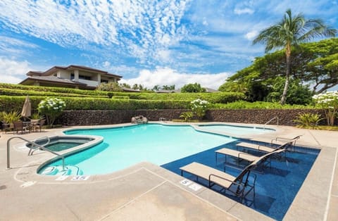 Lovely place to lounge poolside. There is a kiddie pool and spa as well.