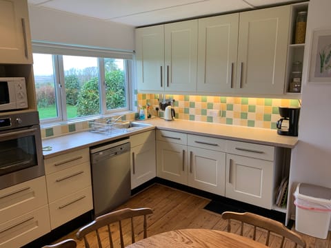Kitchen looks out over back garden