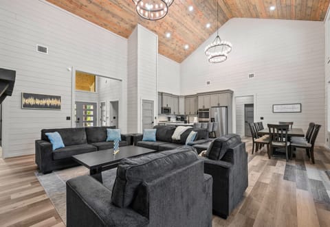 The open layout makes it easy to stay connected whether you’re relaxing by the fire or chatting from the kitchen.