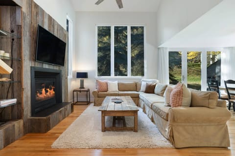 The Living Room features a gas fireplace and large flat screen tv.
