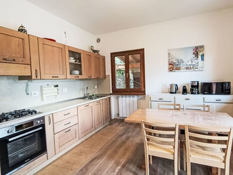 Furniture, Wood, Cabinetry, Kitchen, Countertop, Flooring, Interior Design, Floor, Cupboard, Room