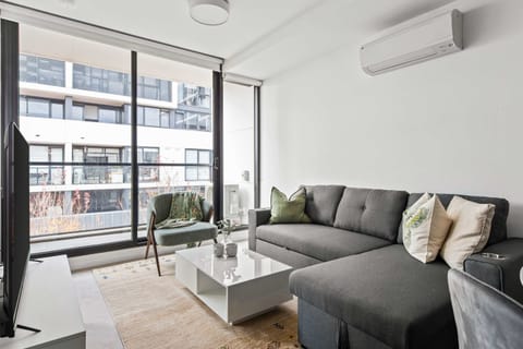 The living area with a 3-seater sofa bed that folds out to a double.