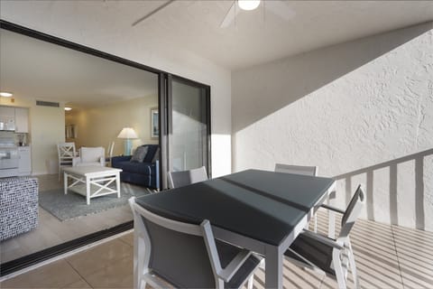 Screened lanai with outdoor dining table