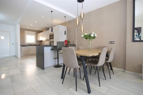 Modern dining area with seating for six guests