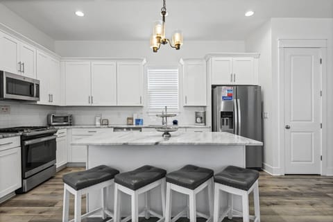 The kitchen offers bar seating for four