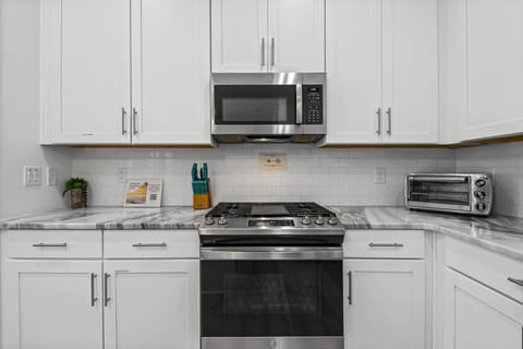 The kitchen has ample counter space and all the tools for your favorite meals