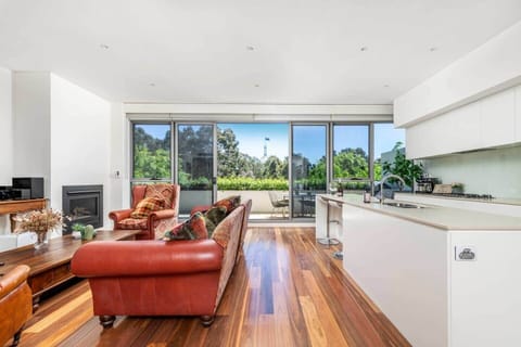 Very spacious living area with views over large balcony to the parliament house flagpole