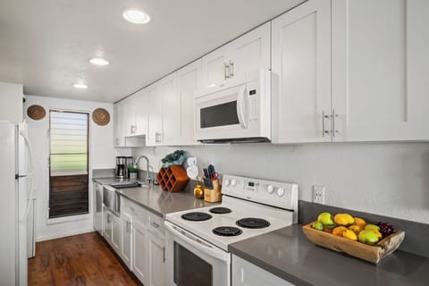 Contemporary Kitchen with Stainless Appliances and Island Touches