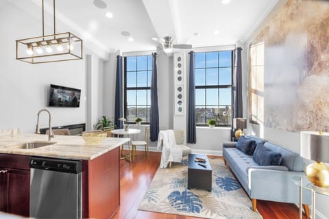 Open-concept design connecting kitchen and living areas for seamless entertaining.