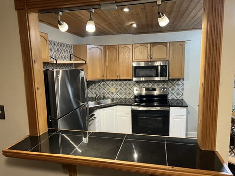 Bar Top to sit and enjoy dinner or a drink. Great open floor plan.