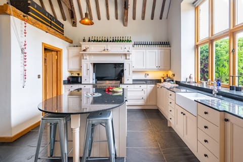 Salty Bottom, Salthouse: The impressive kitchen is flooded with natural light from the double height windows