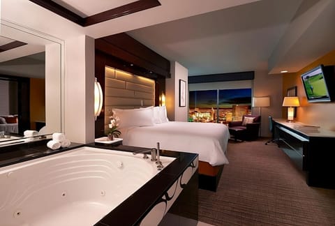 Relax at night with glowing city views from your room.