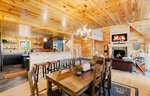 Dining room w/ views of kitchen and living room in background