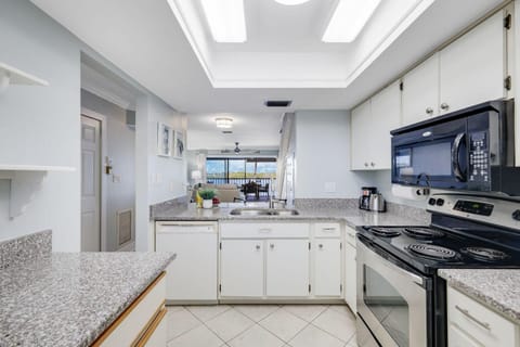 Bright, modern kitchen with skylight and ample counter space