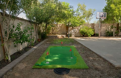 Enjoy endless outdoor fun with your own private putting green and basketball hoop, surrounded by shade trees and sunshine.