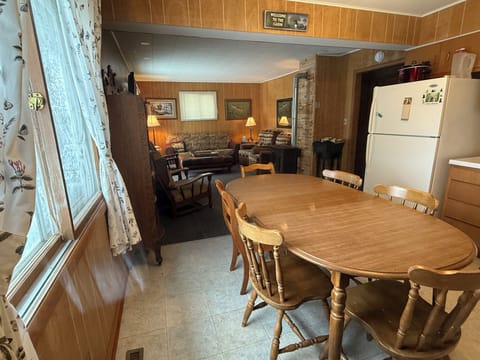 Kitchen has seating for 8, large window with lake view. Dish soap & new sponge.