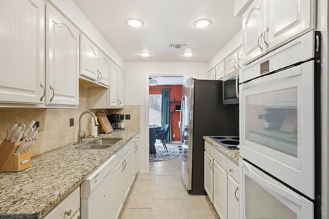 Fully stocked kitchen with poker room in the back