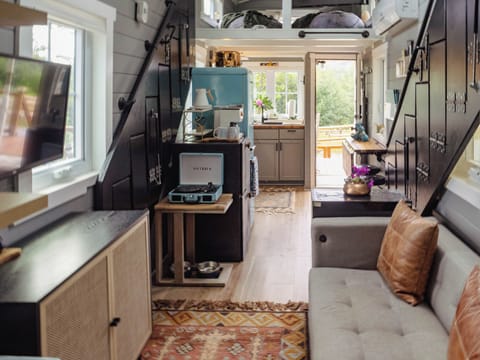 Fold up the stairs, tiny house feels big, all the comforts of home