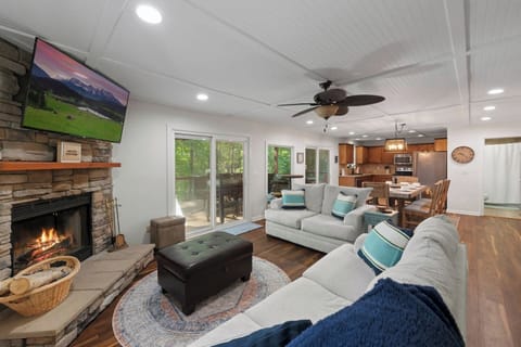 *Plush Couches*Wood burning fireplace (Seasonal from October - May) *55 in. flat screen tv (Bring your own login for streaming apps) 