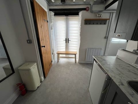 Bathroom and kitchen area