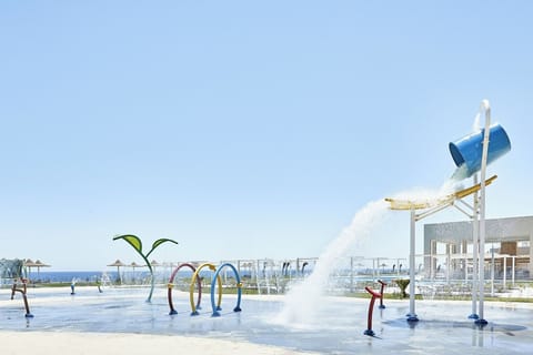 Splash and laugh in the playful water park fountains.