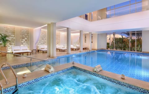 Sink into bubbling warmth in the serene indoor whirlpool.