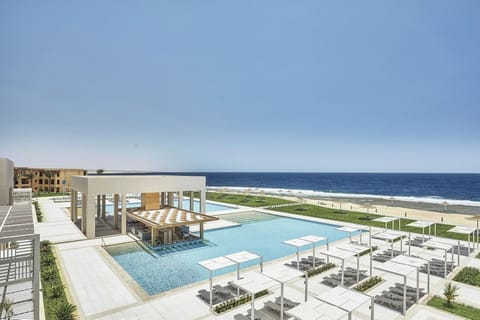 Unwind poolside with uninterrupted sea views and sunshine.