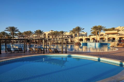 Bask in sunny poolside calm with endless space to lounge.