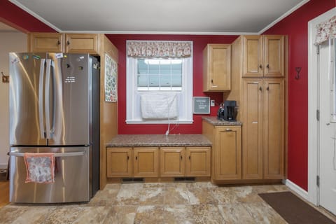 Kitchen stocked with 3 door refrigerator