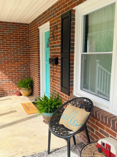 Angle of Front porch for sitting. Keyless entry. alarm & cameras around house