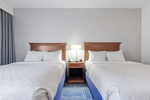 Sink into crisp linens and enjoy a calm, restful night.