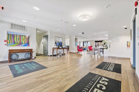 Start your day with fresh coffee in an airy lobby.