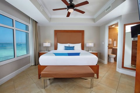 Wake up refreshed in a serene suite with ocean views.