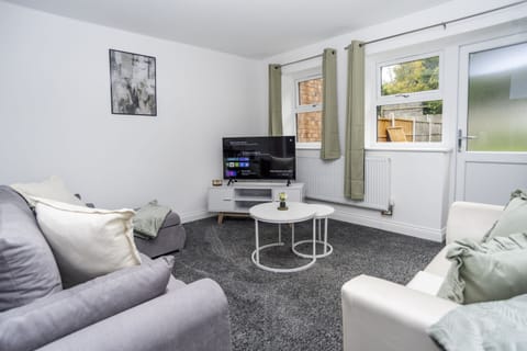 A bright, comfortable lounge designed for relaxing, socialising, or unwinding after a long day.