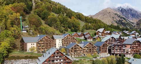 Breathe in the fresh mountain air while enjoying the charming village atmosphere below.