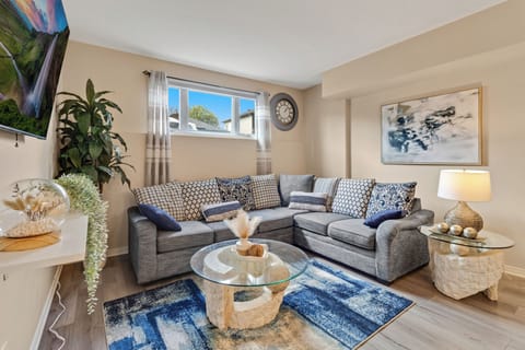 Cuddle up in our cozy living room, with a sofa bed and comfortable air mattress