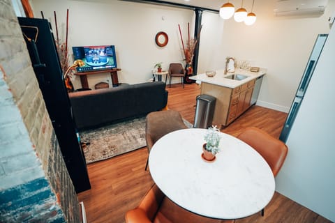 Dining table for 2 - 4 people.  Use extra chair from living room to.