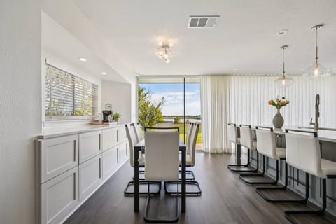 Dining room with bar stool seating on large counter